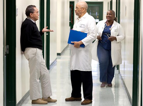 Doctors chatting in the hallway