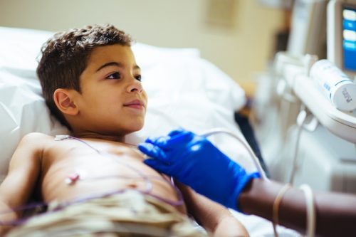 Rashes and heart: Boy with rheumatic fever undergoing an echocardiogram