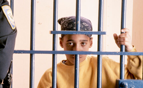 Juvenile justice, boy behind bars