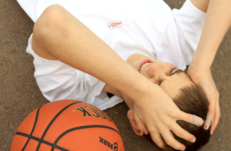 Boy with head trauma during a basketball practice