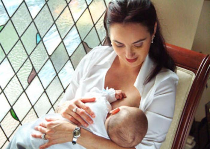 Mother comfortably breastfeeding