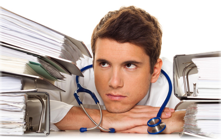 Doctor keeping abreast of medical journals