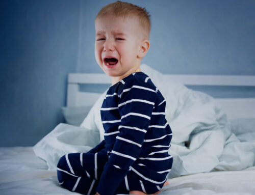 Toddler in bed crying